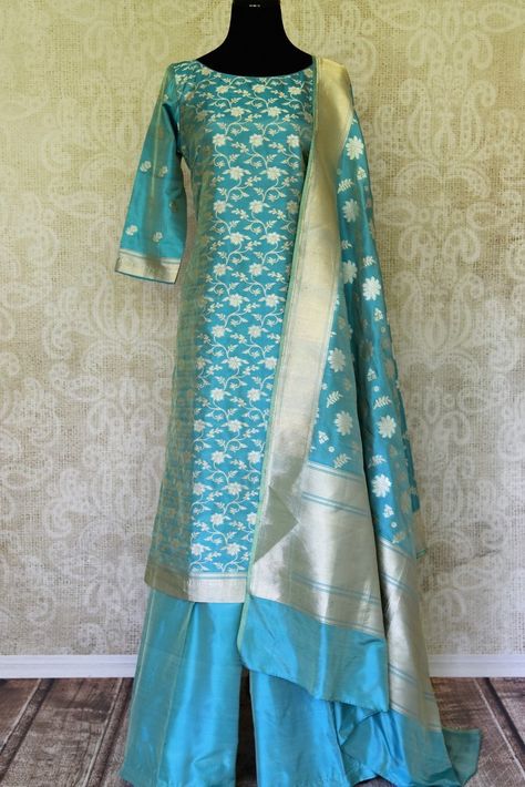 Dress up in a gorgeous light blue pure handloom Banarasi suit for a party or festive celebration. Shop from Pure-Elegance. Orang India, Silk Kurti Designs, Banarasi Suit, Indian Designer Suits, Designer Kurti Patterns, Kurta Design, Gaun Fashion, Indian Salwar Kameez, Kurti Neck Designs