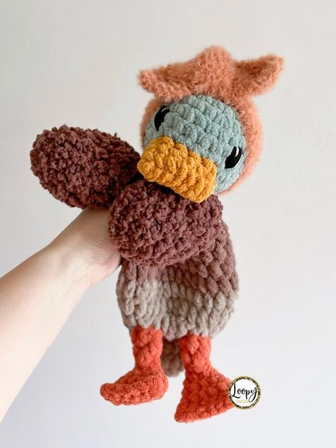 Crochet Della Mallard Duck Lovey Snuggler - Stuffed Animal - Security Blanket #crochetplushieseasy #crochetplushiesideas #crochetpatternsplushies #crochetplushiessmall #crochetplushiesbunny #crochetteddybear #easycrochetplushies Della Duck Crochet, Duck Lovey Crochet Pattern, Cute Duck Crochet Pattern Free, Duck Snuggler Crochet Pattern, Crochet Duck Plushie Free Pattern, Mallard Crochet Pattern Free, Duck Snuggler Crochet Pattern Free, Crochet Duck Snuggler Free Pattern, Crochet Lovey Free Pattern Animals