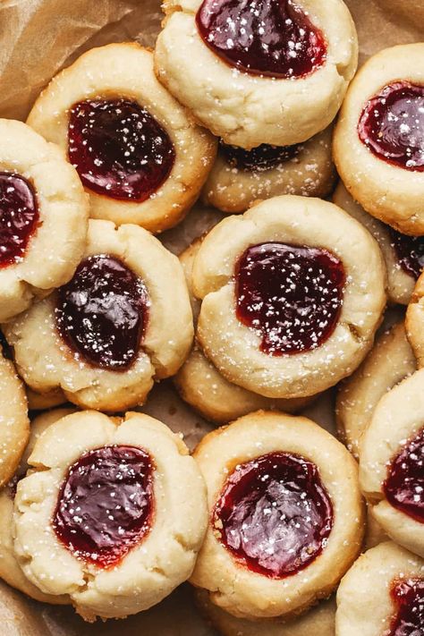 Thumbprint Cookies are a classic festive cookie with a buttery, shortbread cookie base and topped off with all your favorite flavors of jam! Kiss Thumbprint Cookies, Shortbread Jam Cookies, Shortbread Thumbprint Cookies, Fall Desserts Thanksgiving, Jam Thumbprint Cookies, Cookie Base, Thumbprint Cookies Recipe, Buttery Shortbread, Christmas Recipes Easy