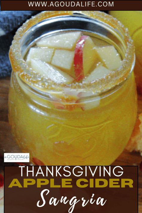 Thanksgiving Apple Cider Sangria - sweet, tart, lightly caramel infused in a sugar rimmed glass - perfect for Thanksgiving, tailgating or any fall celebrations. #thanksgivingrecipe #thanksgivingsangria #thanksgivingapplecidersangria #applecidersangria #whitesangria #whitewinesangria #bestthanksgivingsangria #appleciderrecipe #thanksgivingcocktail #agoudalife Fall Sangria Recipes Easy, Thanksgiving Apple Cider, Autumn Beverages, Thanksgiving Sangria, Apple Cider Sangria Recipe, Fall Sangria Recipes, Caramel Apple Sangria, Fall Apple Cider, Easy Sangria Recipes