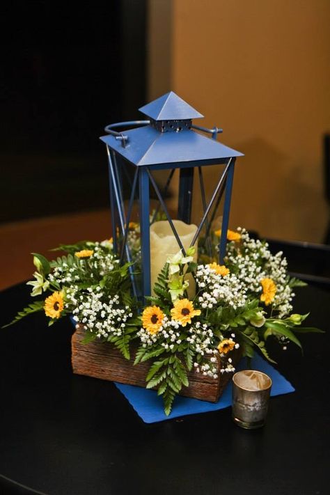 Navy Lantern(Pier 1), Barnwood boxes made by the brides father, blue paper mats for added color. Golden Votives. Navy Blue And Yellow Wedding Decorations, Navy Blue And Sunflower Wedding Theme, Navy Blue And Sunflower Wedding Ideas, Light Grey Groomsmen Suits, Light Grey Groomsmen, Sunflower Wedding Colors, Navy Blue Wedding Table, Yellow Wedding Centerpieces, Paper Lantern Centerpieces