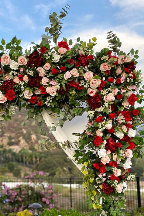 That gorgeous wedding arch could be absolutely stunning for your wedding. I love this idea for making a statement. Keep it to your wedding inspiration. Red And Blush Wedding Flowers, Red Blush White Wedding, Crimson Red And White Wedding, Red White Blush Wedding Flowers, Rose Garden Theme Wedding, Red Pink And White Wedding Flowers, Red Blush Gold Wedding, Burgundy And Red Wedding, Red Wedding Mandap