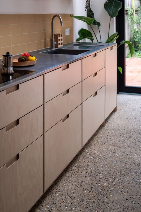 Plykea birch plywood kitchen fronts paired with semi-recessed birch handles, to customise an IKEA kitchen 🖤. Complemented with a stainless steel worktop and poured concrete flooring.  All using IKEA Metod or Sektion cabinets.  #plywoodkitchen #birchplywood #plywood #ikeahack #kitchenideas #kitchentrends  Architect: Studio Manifest Contractor: Omniscient Construction Photographer: David Valinsky Photography Cabinet Aesthetic, Birch Plywood Kitchen, Sektion Cabinets, Stainless Steel Kitchen Cabinets, Architect Studio, Steel Kitchen Cabinets, Scandi Kitchen, Plywood Kitchen, Concrete Flooring