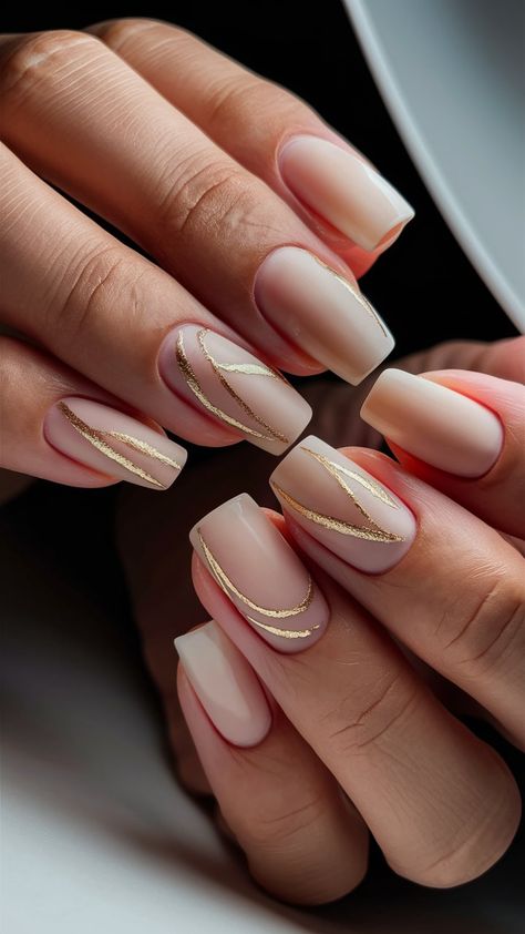 Wrap your nails in warmth with these gorgeous beige ombre creations! ☕🌟 The gradient from light beige to deeper tones exudes a cozy feel, while striking golden lines add a stylish touch. Perfect for fall or any sophisticated event, these nails are a true statement piece! 💖💅 #OmbreNails #NailDesign #GoldAccent Neutral With Gold Nails, Gradient Nude Nails, Nail Gradient Ideas, Golden Ombre Nails, Gold And Beige Nails, Gold Bridesmaid Nails, Beige Gold Nails, Tan And Gold Nails, Beige Ombre Nails