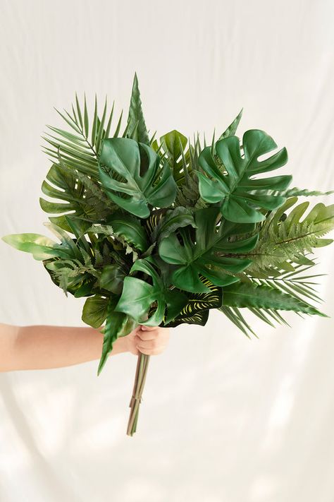 Ling’s Moment makes delicate foam flowers and vintage wedding decor. Our flower arrangements and decorations are affordable and easy to work with. Shop now. Monstera Wedding Decor, Tropical Centerpieces Wedding, Plant Themed Wedding, Monstera Bouquet, Monstera Wedding, Asplenium Nidus, Tropical Wedding Centerpieces, Leaves Bouquet, Tropical Wedding Bouquets