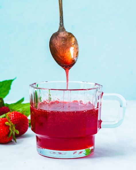 This strawberry syrup recipe is thick and sweet! It's ideal for using in cocktails and drinks, over ice cream, and more. #strawberrysyrup #strawberry #syrup Gingerbread Spice Recipe, Berry Syrup Recipe, Strawberry Syrup Recipe, Strawberry Syrup Recipes, Ice Cream Syrup, Berry Syrup, Strawberry Simple Syrup, Strawberry Cocktails, Strawberry Crisp