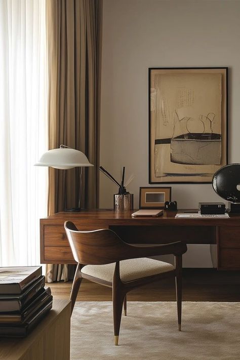 "Bring a touch of elegance to your workspace with a Mid-Century Modern Home Office! 📚🖥️ Perfect for creating a focused and stylish environment. 🌿✨ #InteriorDesign #MidCenturyOffice #WorkFromHome" Madmen Office Decor, Midcentury Modern Home Office, Mid Century Office Design, Home Office Moody, Home Office Mid Century Modern, Mid Century Office Ideas, Midcentury Modern Office, Mid Century Modern Home Office, Office Technology