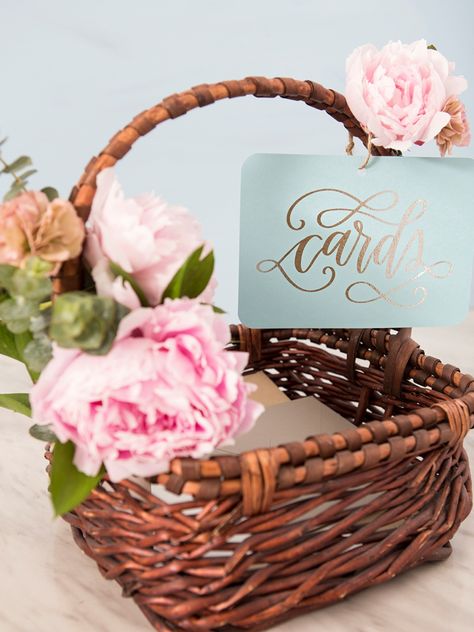 Grab our printable design to make your own wedding card basket! Basket Card Box Wedding, Wedding Shower Basket Ideas, Basket For Cards At Party, Basket For Cards At Wedding, Basket Centerpieces Table Wedding, Wedding Card Basket Ideas, Bridal Shower Card Box Ideas, Baby Shower Card Box Ideas, Card Basket Wedding