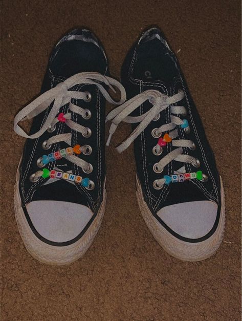 Black and white low top converse with beads on the left shoe’s shoelaces that say “cool beans” and beads on the right shoe’s shoelaces that say “dawg”. Converse Beads On Laces, Shoelace Beads, Converse Beads, Beads On Shoelaces, Beaded Shoelaces, Converse Ideas, Shoe Drawings, Shoe Ideas, Shoes Drawing