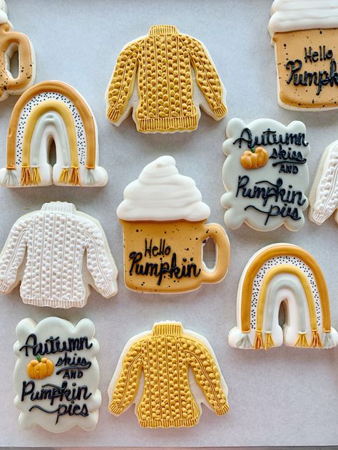 This set of boho inspired sugar cookies includes a knitted sweater in colors ivory and mustard, a rainbow, a coffee cup with the words hello pumpkin, and a plaque with the words Autumn skies and pumpkin pies. Coffee Cup Sugar Cookies, Boho Sugar Cookies, Fall Sugar Cookies, Cookies Fall, Decorated Sugar Cookies, Pumpkin Coffee, Hello Pumpkin, Boho Fall, Cute Sets