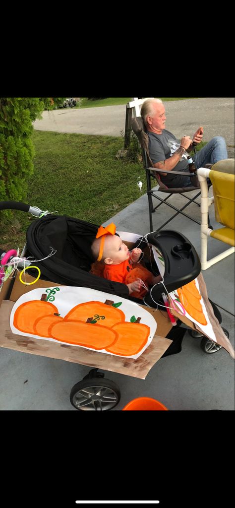 My daughter had a pumpkin onsie, orange tutu, and a orange bow🎃🧡 Halloween Costumes With Stroller Baby, Pumpkin Patch Stroller Costume, Diy Stroller Costumes, Baby Stroller Halloween Costumes, Costumes With Baby Carrier, Baby Pumpkin Costume, Pumpkin Costume, Orange Bows, Baby In Pumpkin