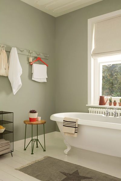 Pale, muted greens make for a serene bathroom space. Try Overtly Olive on bathroom walls with splashes of bright red or coral to add a twist. Dulux Overtly Olive, Overtly Olive, Bathroom Paint Ideas, Makeover Kamar Mandi, Kitchen Colour, Neutral Green, Serene Bathroom, Dulux Paint, Bathroom Paint