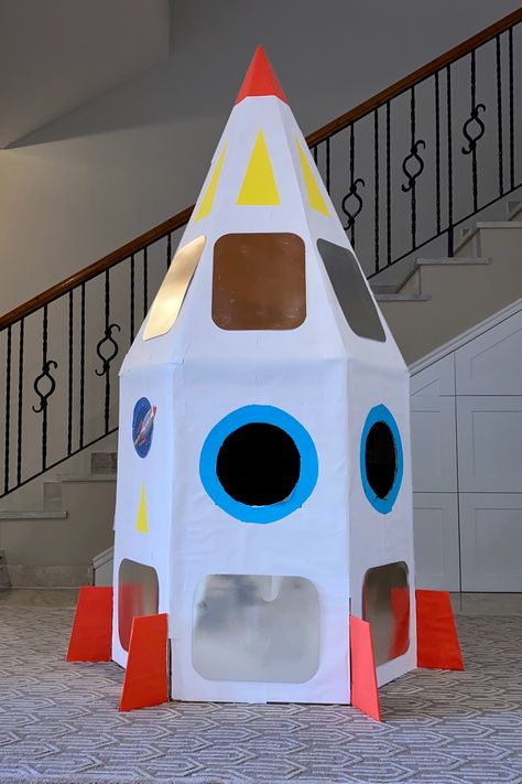 How to build a cardboard rocketship.  Want to build a spaceship for your kids?  Check this out! How To Make A Rocket Ship Out Of Boxes, Cardboard Rocketship, Diy Rocket Ship, Cardboard Rocket Ship, Cardboard Spaceship, Spaceship Craft, Cardboard Rocket, Diy Rocket, Rockets For Kids