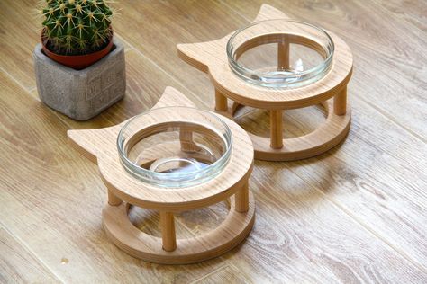 Price for 1pc bowl stand with glass bowl.   Suitable for cats and small dogs. The feder stand is made of wood with oak veneer. All products are natural and eco friendly.  The surface is treated with a water-repellent composition in three layers on a natural basis.  Glass bowls are easy to remove. Glass bowls included. Easy to wash and look stylish. Material - shockproof glass. Rubber legs are mounted below. Thanks to which the stand does not slide on the floor. Fast delivery in only 8-25days Sta Pet Bowls Stand, Pet Bowl Stand, Cat Bowl Stand, Cat Feeding Station, Cat Water Bowl, Modern Cat Furniture, Bowl Stand, Cat Food Bowl, Cat Feeder