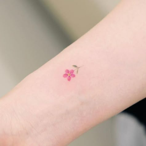 Minimalist Flower Tattoo Color, Tiny Colored Flower Tattoo, Minimalistic Color Tattoo, Dainty Flower Finger Tattoo, Tiny Colour Tattoo, Dainty Colored Tattoos, Small Colour Tattoos For Women, Small Flower Tattoo Color, Tiny Colored Tattoos