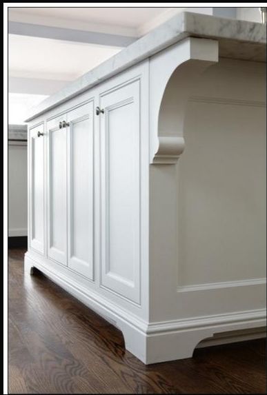 Inset cabinet door style with footed detail Perfect detail to go off of for built ins Door, base detail, corbel.  All great! Kitchen Island Corbels, Corbels Kitchen, Kitchen Cabinet Molding, White Contemporary Kitchen, Inset Cabinet Doors, Cabinet Molding, Cabinet Door Style, Cabinet Trim, Серая Кухня