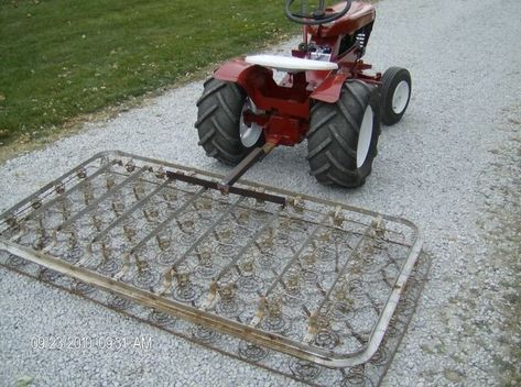 Homemade Tractor Implements, Gravel Driveway Landscaping, Wheel Horse Tractor, Garden Tractor Attachments, Landscape Rake, Yard Tractors, Homemade Tractor, Bed Spring, Food Plot