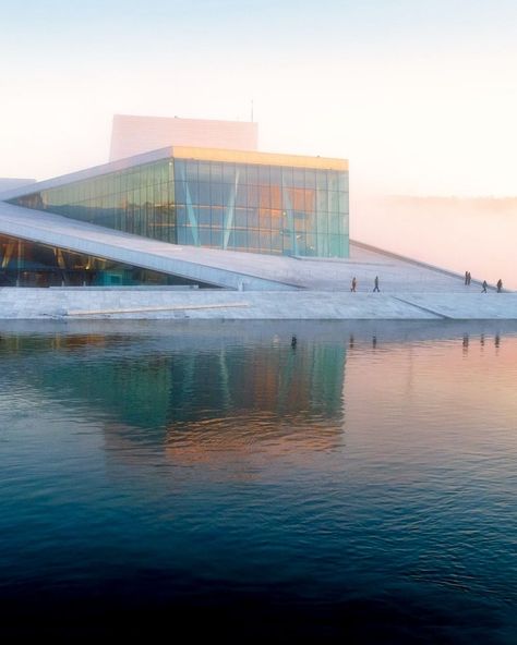 Two incredibly good reasons to visit a place. The Oslo Opera House not only houses the Norwegian National Opera and Ballet, and the national opera theatre, but is also architecturally worth a visit! Definitely a place to see. #NOBLEANDSTYLE #OSLO #OPERAHOUSE Oslo Opera House Architecture, Oslo Opera House, Opera Theatre, Luxury Magazine, Mountain Living, Restaurant Guide, 2025 Vision, Lifestyle Trends, Travel Design