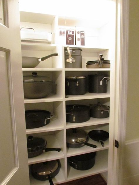 great use for pantry space - I'd have one side for pots and pans and the other for blender, food processor, crock pot, etc Closet Storage Solutions, Cookware Storage, Storage Solutions Closet, Kitchen Pans, Pan Storage, Pantry Remodel, Pot Storage, Small Kitchen Organization, Bedroom Cupboard Designs