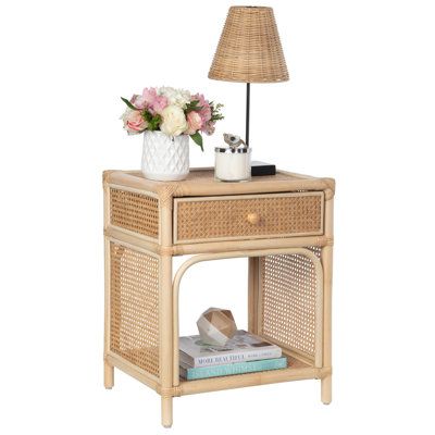 Discover the charm of the Latitude Rattan Cane Bedside Table with Drawer and Open Shelf in Natural—a versatile and handmade addition to your bedroom or living space. Crafted by skilled artisans using traditional craftsmanship, this wicker nightstand showcases a coastal, boho chic, or classic aesthetic with its rattan and cane webbing. With a convenient drawer and a spacious open shelf, this bedside table brings both style and functionality to your bedside or sofa. | Bayou Breeze Delaria 1 - Draw Cane Bedroom, Coastal Boho Chic, Cane Bedside Tables, Wicker Nightstand, Bedside Table Ideas, Rattan Nightstand, Rattan Bedroom, Bedside Table With Drawer, Coastal Vintage