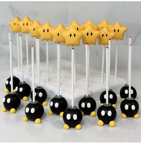 Mario And Luigi Desserts, Bowser Cake Pops, Mario Birthday Party Cake Pops, Super Mario Party Desserts, Super Mario Dessert Ideas, Mario Kart Cake Pops, Super Mario Bros Party Desserts, Mario Birthday Cake Pops, Mario Party Cake Pops