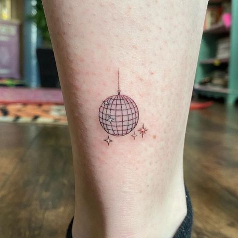 Tiny Disco Ball Tattoo, Mirror Ball Tattoo, Disco Tattoo, Mirrorball Tattoo, Holiday Tattoos, Disco Ball Tattoo, Hannah Tattoo, Dm Ideas, Meaningful Word Tattoos