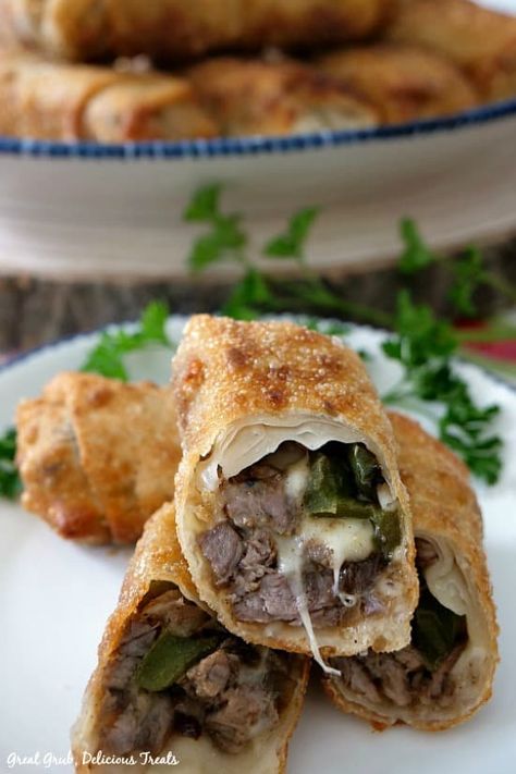 Philly Cheesesteak Egg Rolls Philly Cheesesteak Eggrolls, Cheesesteak Eggrolls, Philly Cheesecake, Philly Cheesesteak Egg Rolls, Philly Cheese Steak Recipe, Philly Steak, Egg Roll Recipes, Delicious Appetizer Recipes, Philly Cheesesteak