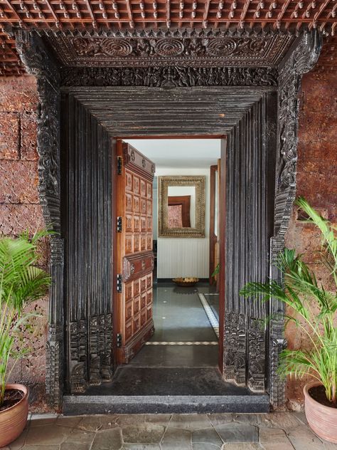 This Mumbai bungalow is a vision of old Kerala | Architectural Digest India Kerala Architecture, India Home Decor, Indian Home Design, Indian Home Interior, Pooja Room Door Design, Kerala House Design, Kerala Houses, Room Door Design, Stone Masonry