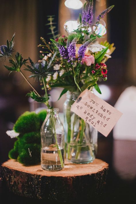 wildflower centerpieces with luggage tag quotes | www.onefabday.com Milk Bottle Centerpiece Wedding, Clambake Wedding, Milk Bottle Centerpiece, 1940s Party, Tag Quotes, Wildflower Centerpieces, Wildflower Decor, Backyard Celebration, Bottle Centerpieces