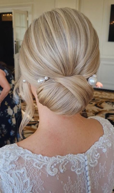 Low Updo Hairstyles Wedding, Bride Hair Chignon, Clean Wedding Hair Updo, Grey Hair Updo Wedding, Low Romantic Updo Brides, Low Updo Wedding Hair Blonde, Bride Wedding Hair Updo, Bridal Low Bun With Pearls, Silver Hair Updo