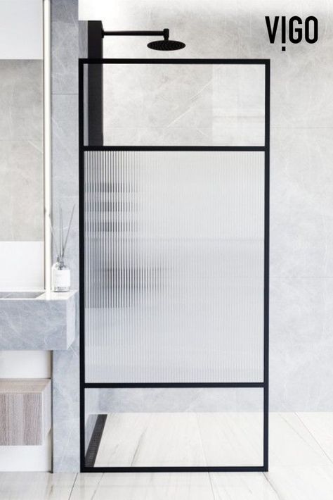 Inspired by the Art Deco era of the 1920s, The Essex by VIGO showcases reeded glass. Flat glass panels add dimension to your bathroom without sacrificing space. Casually step into the shower with its seamless walk-in shower entry that creates a spa-like feel. | VIGO Design Ideas - Remodels - Home Interior #vigoindustries #bathroom #bathroomdesign #bathroominspo #bathroominspiration #bathroomgoals #bathroomdecor Bathroom Fixed Glass Panel, Reeded Glass Shower Door, Ribbed Glass Shower Screen, Fluted Glass Shower Screen Door, Vigo Shower, Fixed Shower Glass Panel, Framed Shower Screen, Shower Door Panel, Shower Frame