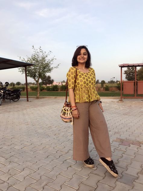 #indianoutfit #outfitinspo #fashion #shorthair #peplumtop #indianoutfit #potlibag #pallazzopants #happypic #stylingtips #yellowtop #outfitoftheday #potd Short Kurti Styling, Short Tops With Jeans Indian, Tunic Outfit Summer, Short Top Designs, Simple College Outfits, Cotton Dress Pattern, Stylish Kurtis Design, Beautiful Casual Dresses, Western Wear Outfits