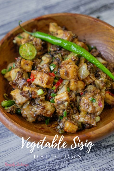 This Tofu Sisig is a savory Filipino dish that is made with fried tofu, lime juice, chopped chili peppers, mushrooms, and vegan mayonnaise. It's a great recipe for a healthy and delicious lunch or dinner with the whole family. Check this out! Vegan Sisig, Tofu Sisig, Filipino Vegetable Recipes, Vegan Filipino, Sisig Recipe, Best Tofu, Protein Vegetables, Vegetables Salad, Filipino Dish