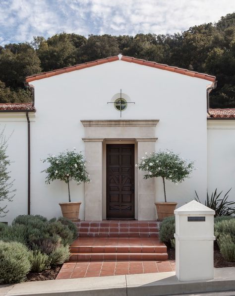 Colonial Revival Exterior, Spanish Revival Exterior, Spanish Colonial Revival, Colonial House Exteriors, Stone Fireplace Mantel, Santa Monica Mountains, Revival Architecture, Mediterranean Style Homes, Wood Floors Wide Plank