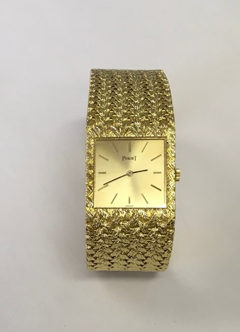 "Genuine Piaget watch with a manual movement in 18 karat yellow gold with a woven 18 karat yellow gold bracelet.  The watch measures 7\" long and 7/8\" wide.  It has a square case and gold stick dial.  Watch is in excellent condition and was serviced 1/9/2021.  Preowned.  Serial # 362124.  Model # 9352D2." Piaget Watch, Fancy Watches, Luxury Bags Collection, Titanium Watches, Crosses Decor, Cartoon Wallpaper Iphone, Cartier Watch, Yellow Gold Bracelet, Lovely Ring