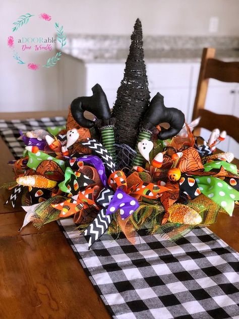 Need something fun and unique for your Halloween table this year? This one of a kind centerpiece will make a huge statement on your kitchen table, entryway or porch. Decorated with grapevine for the cone of the hat, the brim includes two different colors of mesh, seven styles of Hocus Pocus Table Centerpiece, Halloween Flower Decorations, Witch Hat Centerpiece, Table Decorations Halloween, Halloween Witch Hat Wreath, Halloween Craft Activities, Halloween Table Centerpieces, Halloween Centers, Glass Spider