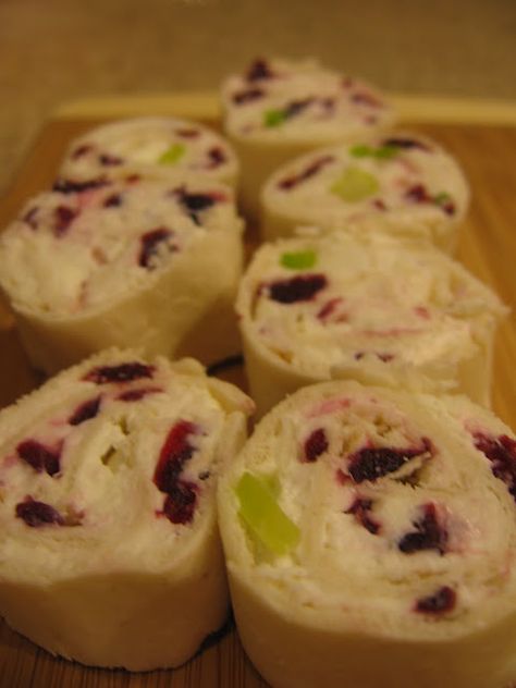 Cranberry Feta Pinwheels- Taste of Home/ 1 - 8oz carton of whipped cream cheese, 1 c feta cheese, 1/4 c chopped green onions, 1 -6oz chopped dried cranberries, 4 -10 " flour tortillas,Mix the cream cheese, feta, green onions, and dried cranberries. Spread 1/2 c mixture on tortillas & roll up. Wrap in plastic wrap & refrigerate 1 hr. Slice & serve. Cranberry Feta Pinwheels, Feta Pinwheels, Stick Butter, Recipes Appetizers And Snacks, Whipped Cream Cheese, Up North, Party Food Appetizers, Best Appetizers, Taste Of Home