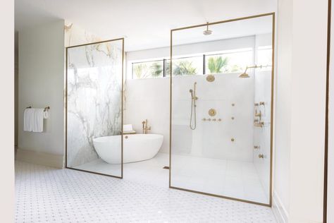 V Starr showcases refined style in the bath of Serena Williams, illuminating the simple, yet intricate design of the Litze Collection by Brizo in Brilliance Luxe Gold. Photography: Ryan Loco Brass Glass Shower Door, Brass Bathroo, Modern Florida Home, Brass Framed Shower Doors, Marble Brass Bathroom Master Bath, Brizo Luxe Gold Shower, Shower Tub Combo, Marble Shower Walls, Tile Bathrooms