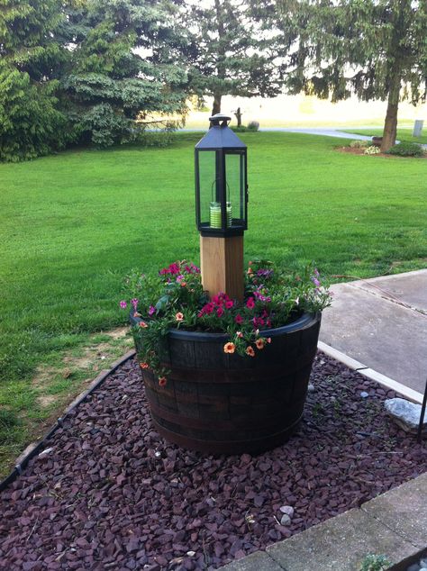 Planter With Solar Light, Wine Barrel Planter Ideas Front Porches, Whiskey Barrel Lights, Barrel Planter Ideas With Lights, Barrel Planter Ideas Front Yards, Solar Lights In Flower Pots, Whiskey Barrel Planter With Lights, Whiskey Barrel Ideas Planters, Flower Planter Ideas Outdoor