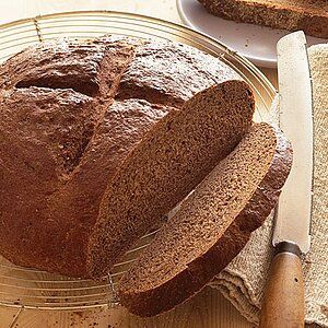 Pumpernickel Rye Recipe | MyRecipes Pumpernickel Bread Recipe Dutch Oven, No Knead Pumpernickel Bread Dutch Oven, Dutch Oven Pumpernickel Bread, Pumpernickel Bread Recipe, Garbage Bread, Pumpernickel Bread, Baking Store, Rye Bread Recipes, Oven Bread