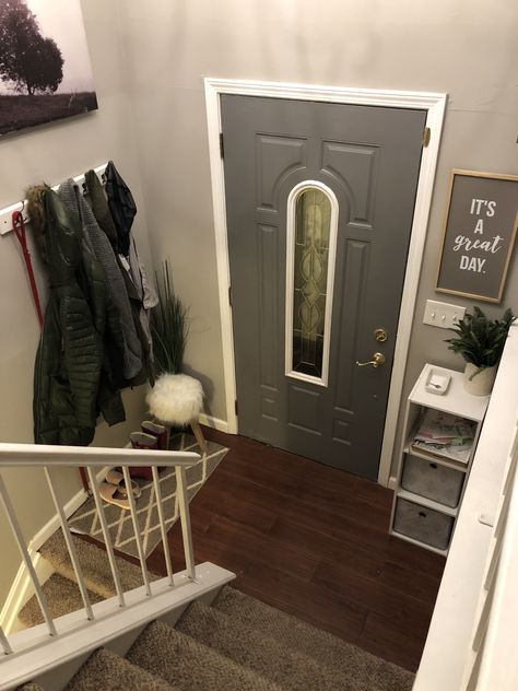 Small Entryway Split Level Front Entry, Small Entryway Ideas Raised Ranch, Split Foyer Decorating Ideas, Split Level Stair Wall Decor, Split Level House Decorating, Split Level Entryway Organization, Small Split Foyer Entryway Ideas, Small Foyer Ideas Entryway Split Level, Small Split Entry Ideas