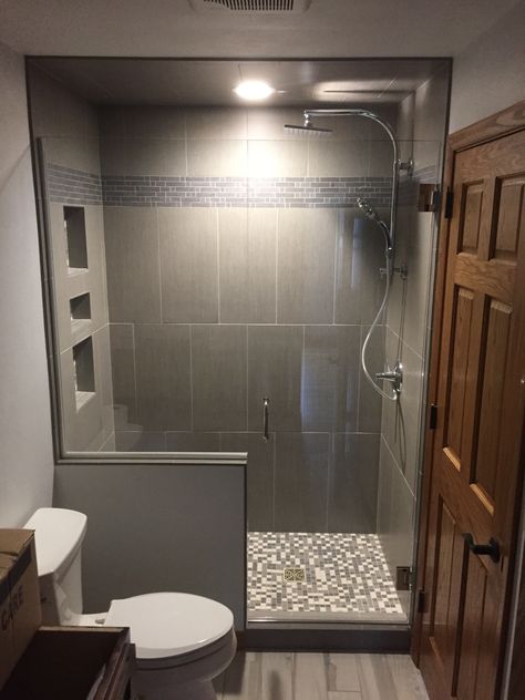 Custom heavy glass shower door and a panel on a half wall. Small Bathroom Half Wall Shower Ideas, Shower Stall With Half Wall, Walk In Shower Half Wall Next To Toilet, Half Shower Door, Toilet Next To Shower Stall, Shower With Half Wall And Glass Door, Half Glass Shower Wall, Alcove Shower Ideas, Shower With Half Wall