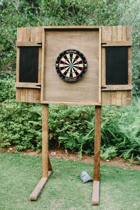 Dart Board Backboard Outdoor, Diy Wood Projects Outdoor Yard Games, Dart Board Wedding, Small Patio Wall Decor, Outdoor Dart Board Cabinet, Backyard Yard Game Area, Horseshoe Pits Backyard, Dart Board Outside, Wedding Dart Board