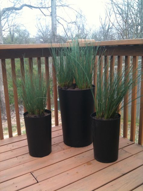 Oversized ceramic planters can sell for hundreds of dollars. Jill Krause of Baby Rabies used round trash cans ($15 each) to get a similar look for less. Diy Trash Can Planters, Birmingham House, Cheap Planters, Modern Planters Outdoor, Yard Inspiration, Cheap Plants, Large Outdoor Planters, Container Ideas, Budget Garden