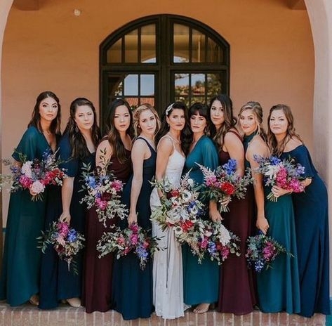 marsala and navy dresses for bride and bridesmaids   #wedding #weddingcolors #weddingideas Teal And Burgundy Bridesmaid Dresses, Jewel Tone Bridesmaid Dresses Fall, Dark Mismatched Bridesmaid Dresses, Jewel Tones Bridesmaid Dresses, Jewel Tone Groomsmen Attire, Jewel Toned Bridesmaid Dresses, Bridesmaid Dresses Jewel Tones, Dark Teal And Burgundy Wedding, Jewel Tone Wedding Party