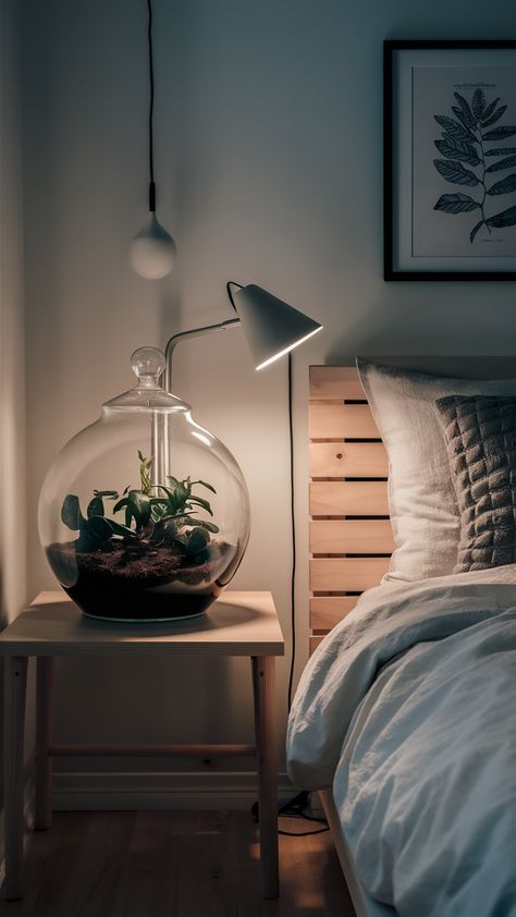 Create a calming retreat in your bedroom with the beauty of terrariums! This IKEA-style setup features a stunning glass terrarium on a minimalist wooden bedside table, perfectly complemented by a crisp white duvet cover and a sleek bedside lamp. A framed botanical print adds a personal touch, while gentle ambient lighting enhances the serene atmosphere. Discover how to bring nature indoors and transform your sleeping space into a restful oasis. Ready to elevate your bedroom decor? Click for more inspiration! #BedroomDecor #TerrariumDesign #IKEAStyle #MinimalistLiving #NatureInspired #HomeStyling #CalmSpaces Ikea Style, White Duvet Cover, Bring Nature Indoors, Bedroom Oasis, Wooden Bedside Table, Serene Bedroom, White Duvet Covers, White Duvet, Framed Botanicals