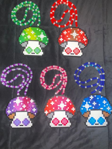 *Trippy Mushroom Perler Necklace *Choose your colour *Necklace or no necklace option available *Bead colours may vary slightly from pictures but will always be cute!!  *Every order comes with a hand written note Enjoy USA BUYERS: Please note that the small packet shipping option comes with NO TRACKING. New Perler Bead Patterns, Pearler Necklace Ideas, Perler Necklace Ideas, Rave Perler Necklaces, Rave Fuse Beads, Perler Ideas Rave, Perler Bead Crystal, Liquid Stranger Perler, Perler Bead Necklace Ideas