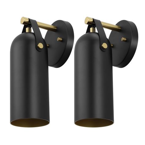 Add chic and modern lighting to your home with our stylish Westley wall sconces. Showcasing a sleek profile and elegant details, our wall sconces lend a chic and fashionable edge to any room. Its sleek cylindrical shades hang from leather straps to make a stunning statement. Featuring a black metallic finish and gold accents, our wall sconces lend sophisticated drama to a variety of styles and decor. Its metallic shades diffuse light vertically to create a soft, focused glow in your bedroom, hom Modern Maximalist Decor, Scandinavian Wall Decor, Iron Wall Sconces, Leather Wall, Maximalist Decor, Simple Furniture, Minimalist Furniture, Wall Light Fixtures, Black And Brass