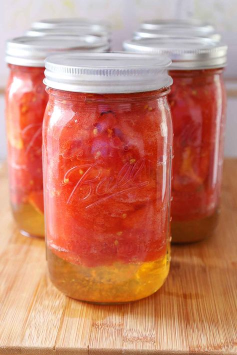 Experience the taste of summer all year long with these homemade canned tomatoes! Discover the satisfaction of preserving fresh, ripe tomatoes using the hot water bath method. From hearty sauces to comforting soups, elevate your recipes with the vibrant flavors of home-canned tomatoes. Get this canning recipe and more at Honeybunch Hunts website. Water Bath Canned Tomatoes, Hot Water Bath Canning Tomatoes, Homemade Canned Tomatoes, Canning Tomatoes Water Bath, Canning Homemade Salsa, Hot Water Bath Canning, Low Acid Recipes, Canning Recipe, Canned Tomatoes