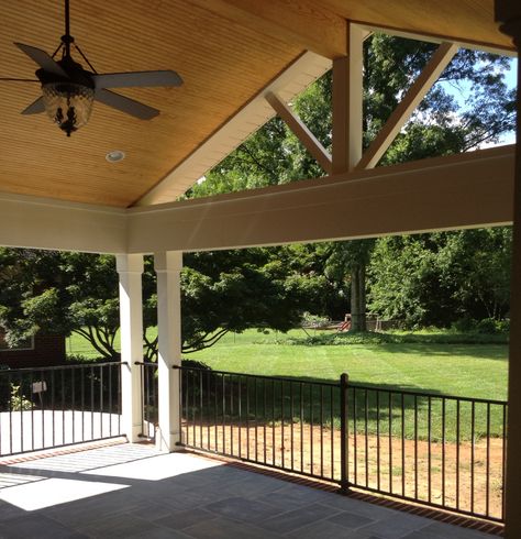 Raleigh Covered porch with Cathedral Ceiling - I really love the limestone floor on this patio. Cathedral Ceiling Outdoor Patio, Covered Patio Vaulted Ceiling, Cathedral Ceiling Porch, Cathedral Porch Ceiling, Patio Ceilings, Patio Ceiling Ideas, Carport Addition, Limestone Patio, Dream Porch